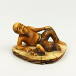 japanese antique Carved ivory netsuke of man and fish